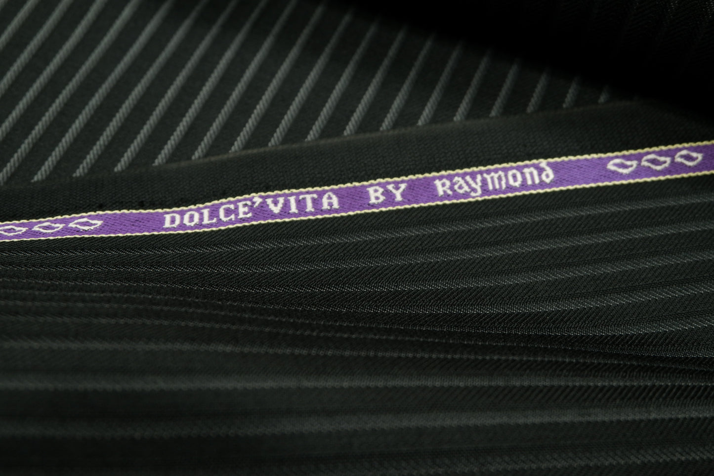 Raymond Greenish Black Self Stripes Poly Wool Fabric